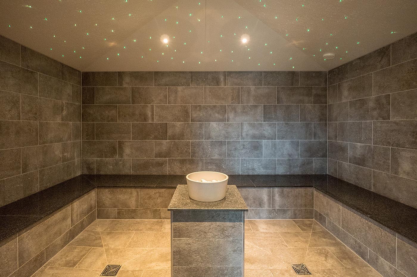 Steam bath with natural stone and starry sky in the public bath in Dresden. made by corso.
