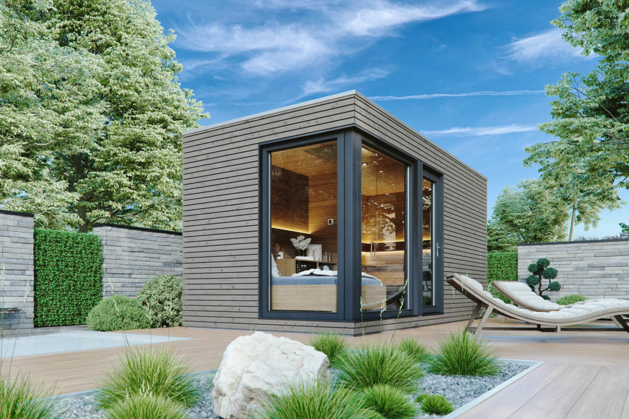 Design Gartensauna XL 3 Design Gartensauna RHOMBUS auf Gartenterrasse am Pool mit großzügiger Verglasung sowie großem Ruheraum mit Daybed. Rhombus Holzprofil-Verkleidung.